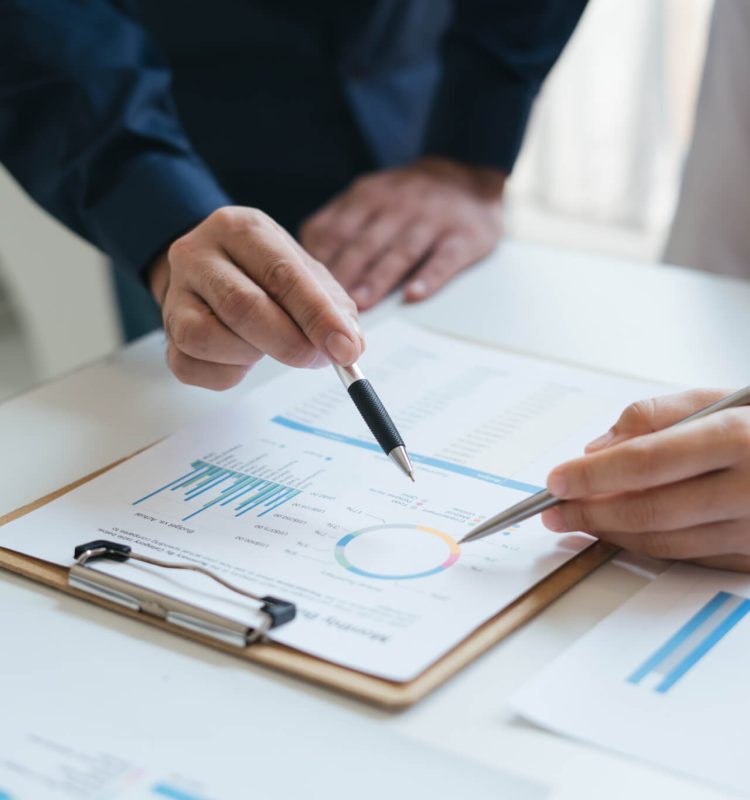 business-sales-consultant-discussing-in-data-documents-at-modern-office-.jpg